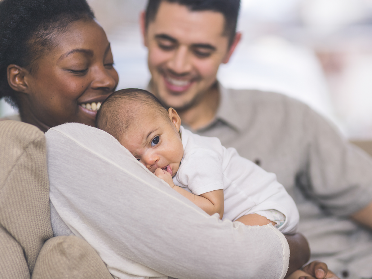 Multiracial family with infant baby